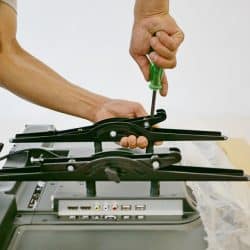 Unscrew Wall mount from TV