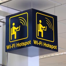 Shows aWiFi hotspot sign in a public place